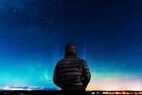 Man staring into the sky. Original public domain image from Wikimedia Commons