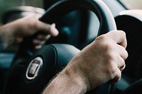 Hands on the steering wheel. Original public domain image from Wikimedia Commons