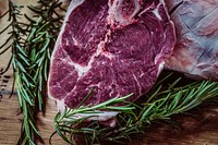 Raw steak with fresh rosemary and herbs on a rustic table. Original public domain image from <a href="https://commons.wikimedia.org/wiki/File:Steak_and_Herbs_(Unsplash).jpg" target="_blank" rel="noopener noreferrer nofollow">Wikimedia Commons</a>