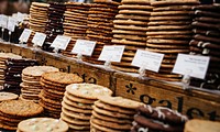 A display of several different kinds of cookies at a bakery. Original public domain image from <a href="https://commons.wikimedia.org/wiki/File:The_Cookie_Monster%27s_Dream_(Unsplash).jpg" target="_blank" rel="noopener noreferrer nofollow">Wikimedia Commons</a>