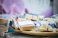 Bars of handmade soap on a platter. Original public domain image from <a href="https://commons.wikimedia.org/wiki/File:Hand_crafted_soap_(Unsplash).jpg" target="_blank" rel="noopener noreferrer nofollow">Wikimedia Commons</a>