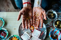 Groom hands in India. Original public domain image from Wikimedia Commons