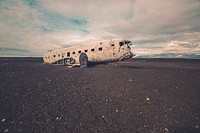 Old passenger airplane wreck on the beach in Iceland. Original public domain image from <a href="https://commons.wikimedia.org/wiki/File:Passenger_airplane_wreck_(Unsplash).jpg" target="_blank" rel="noopener noreferrer nofollow">Wikimedia Commons</a>