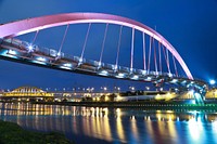 Pink steel bridge at night. Original public domain image from Wikimedia Commons