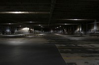A dark empty concrete parking space in Milwaukee. Original public domain image from <a href="https://commons.wikimedia.org/wiki/File:Dark_empty_parking_space_(Unsplash).jpg" target="_blank" rel="noopener noreferrer nofollow">Wikimedia Commons</a>