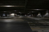 A dark empty concrete parking space in Milwaukee. Original public domain image from Wikimedia Commons