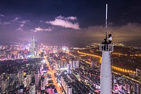 Couple on top of the meta tower. Original public domain image from Wikimedia Commons