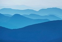 Blue-hued mountain ridges in a thick fog. Original public domain image from Wikimedia Commons