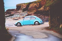 Sky blue Volkswagen Beetle parked near the beach at Padstow. Original public domain image from Wikimedia Commons