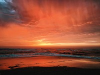 Beach sunset, red sky, cloudy. Original public domain image from <a href="https://commons.wikimedia.org/wiki/File:Roman_Kraft_2016-10-10_(Unsplash).jpg" target="_blank">Wikimedia Commons</a>