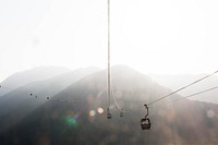 Cable cars in the mist. Original public domain image from <a href="https://commons.wikimedia.org/wiki/File:Hong_Kong_(Unsplash_uJvaKMXiqRs).jpg" target="_blank">Wikimedia Commons</a>