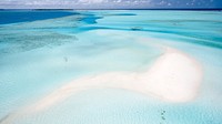Coastal turquoise clear ocean at Dhaalu Atoll. Original public domain image from <a href="https://commons.wikimedia.org/wiki/File:My_Home._(Unsplash).jpg" target="_blank" rel="noopener noreferrer nofollow">Wikimedia Commons</a>