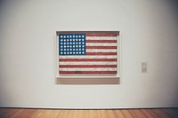 An American Flag painting on a wall in a museum. Original public domain image from Wikimedia Commons