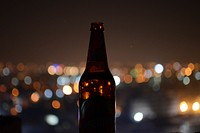 Shallow focus of brown glass bottle. Original public domain image from <a href="https://commons.wikimedia.org/wiki/File:Eeshan_Garg_2017_(Unsplash).jpg" target="_blank">Wikimedia Commons</a>