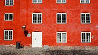 The Red Building. Original public domain image from <a href="https://commons.wikimedia.org/wiki/File:The_Red_Building_(Unsplash).jpg" target="_blank" rel="noopener noreferrer nofollow">Wikimedia Commons</a>