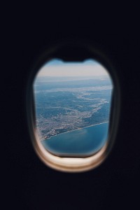View of a coastline from the window of an airplane.. Original public domain image from Wikimedia Commons
