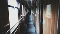 The corridor in an old passenger train. Original public domain image from Wikimedia Commons