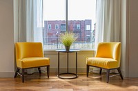 Two yellow padded chairs. Original public domain image from <a href="https://commons.wikimedia.org/wiki/File:Michael_Browning_2017_(Unsplash).jpg" target="_blank">Wikimedia Commons</a>