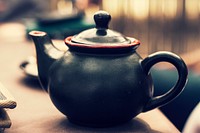 Black and red ceramic kettle. Original public domain image from Wikimedia Commons