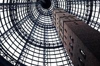 Low angle of gray concrete tower. Original public domain image from Wikimedia Commons