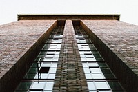 Bottom view on brown concrete building. Original public domain image from Wikimedia Commons