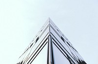The corner of an all glass building in Berlin. Original public domain image from <a href="https://commons.wikimedia.org/wiki/File:Berlin_building_(Unsplash).jpg" target="_blank" rel="noopener noreferrer nofollow">Wikimedia Commons</a>