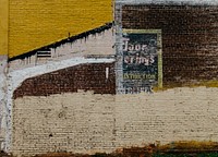 Old brick wall with some graffiti. Original public domain image from Wikimedia Commons