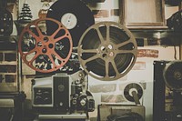 Vintage projector reel. Original public domain image from <a href="https://commons.wikimedia.org/wiki/File:Noom_Peerapong_2015_(Unsplash).jpg" target="_blank">Wikimedia Commons</a>