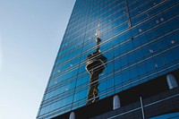 Reflection of CN tower on glass skyscraper windows in daytime, Toronto. Original public domain image from Wikimedia Commons