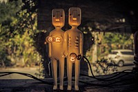 Funny sculpture of a male\u002Ffemale pair with electrical body parts. Original public domain image from <a href="https://commons.wikimedia.org/wiki/File:The_body_electric_(Unsplash).jpg" target="_blank" rel="noopener noreferrer nofollow">Wikimedia Commons</a>