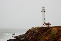 White lighthouse. Original public domain image from Wikimedia Commons