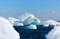 The icebergs of Iceland's Vatnajokull intermingle among the ocean. Original public domain image from Wikimedia Commons