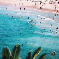 People swimming in the beach. Original public domain image from Wikimedia Commons