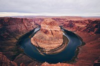 Panoramic shot of the famous Horseshoe Bend and surrounding canyons.. Original public domain image from Wikimedia Commons