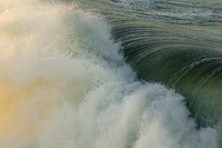 Ocean wave crashing at Huntington Beach. Original public domain image from Wikimedia Commons