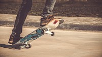 Cropped shot of a skateboarder&#39;s feet. Original public domain image from <a href="https://commons.wikimedia.org/wiki/File:Skate_(Unsplash).jpg" target="_blank">Wikimedia Commons</a>