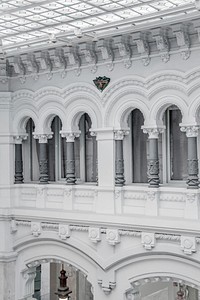 The facade of a building in Madrid has the classical architecture with Corinthian columns.. Original public domain image from <a href="https://commons.wikimedia.org/wiki/File:Classical_Building_Madrid_(Unsplash).jpg" target="_blank" rel="noopener noreferrer nofollow">Wikimedia Commons</a>
