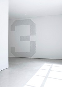 A large number three painted on a white wall in an empty room. Original public domain image from <a href="https://commons.wikimedia.org/wiki/File:Number_three_in_a_white_room_(Unsplash).jpg" target="_blank" rel="noopener noreferrer nofollow">Wikimedia Commons</a>