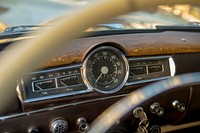 Close up of the dashboard of a vintage car. Original public domain image from <a href="https://commons.wikimedia.org/wiki/File:Vintage_car_dashboard_(Unsplash).jpg" target="_blank">Wikimedia Commons</a>