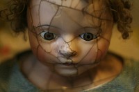 Cracked doll. Original public domain image from Wikimedia Commons