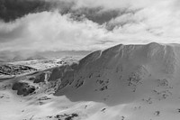 A desaturated shot of snowy hills in Getryggen. Original public domain image from <a href="https://commons.wikimedia.org/wiki/File:Wintry_hills_in_Getryggen_(Unsplash).jpg" target="_blank" rel="noopener noreferrer nofollow">Wikimedia Commons</a>