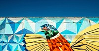 A colorful geometric graffiti drawing of a bird on a wall in Detroit, United States, 26 April 2017. Original public domain image from Wikimedia Commons