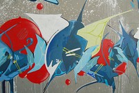 Colorful abstract graffiti artwork mural on wall with white spray paint. Original public domain image from Wikimedia Commons