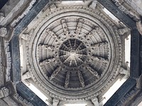 Ornate concentric circular ceiling architecture with dome in Ranakpur Jain Temple. Original public domain image from Wikimedia Commons