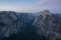 High view of Yosemite Valley in the afternoon. Original public domain image from <a href="https://commons.wikimedia.org/wiki/File:Half_Dome_sunset_(Unsplash).jpg" target="_blank" rel="noopener noreferrer nofollow">Wikimedia Commons</a>