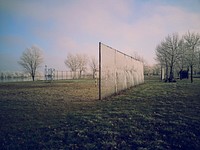 Nets line an empty soccer field in the winter. Original public domain image from <a href="https://commons.wikimedia.org/wiki/File:Soccer_Field_(Unsplash).jpg" target="_blank" rel="noopener noreferrer nofollow">Wikimedia Commons</a>