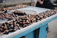 Roasted chestnut. Original public domain image from <a href="https://commons.wikimedia.org/wiki/File:Emre_Gencer_2017-02-08_(Unsplash).jpg" target="_blank">Wikimedia Commons</a>