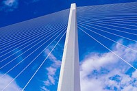 Low-angle of white suspension bridge. Original public domain image from Wikimedia Commons