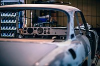 Rear right-side view of a stripped out vintage car.. Original public domain image from <a href="https://commons.wikimedia.org/wiki/File:Stripped_vintage_car._(Unsplash).jpg" target="_blank" rel="noopener noreferrer nofollow">Wikimedia Commons</a>