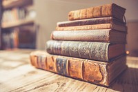 A stack of old leather bound books. Original public domain image from Wikimedia Commons